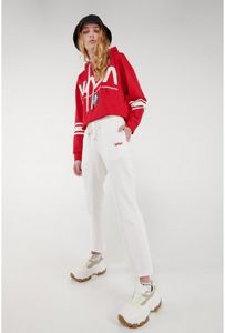 Oferta de Pantalón jogger crema claro con estampado rojo de NASA por $17,34 en Koaj