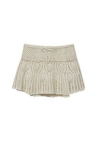 Oferta de Minifalda crochet cordón por $45,99 en Pull & Bear